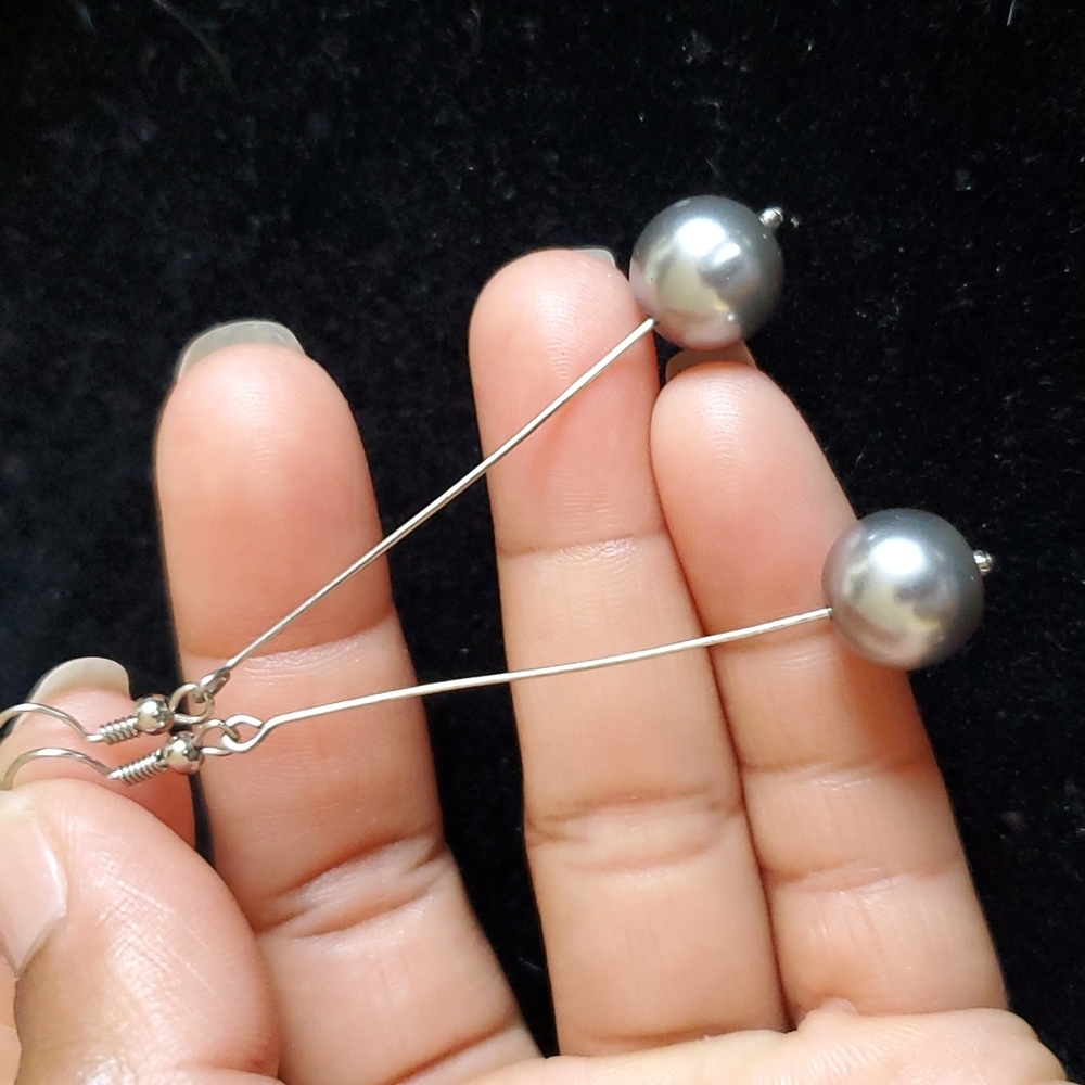 Glass silver color earrings.